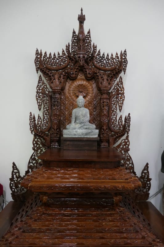 044 Buddha Statue on Wooden Seat from Afar