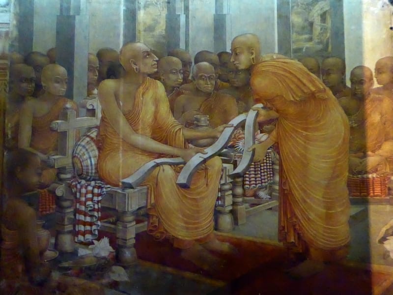 115 Buddhaghosa with three copies of Visuddhimagga