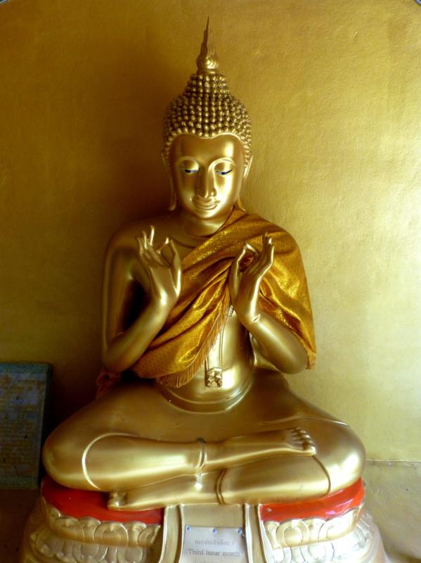 Buddha holding Unusual Mudra